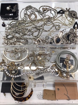 Lot 43 - Group of silver and white metal chains, pendants, earrings etc, together with other costume jewellery within a three draw clear plastic jewellery box