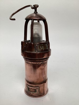 Lot 2626 - The CEAG inspection lamp, a French battery powered copper miners' lamp, a musical miners' lamp and a small Lamp & Limelight lamp (4)