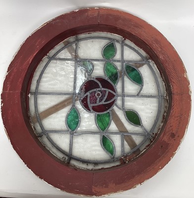 Lot 2634 - Stained glass panel of a rose, framed, 47cm diameter