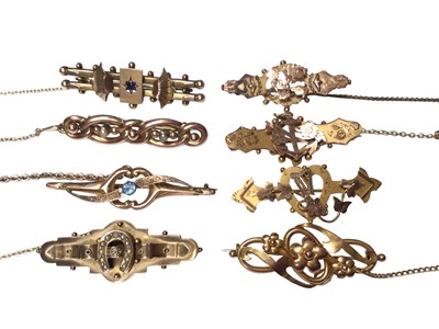 Lot 86 - Eight Victorian and Edwardian 9ct gold bar brooches