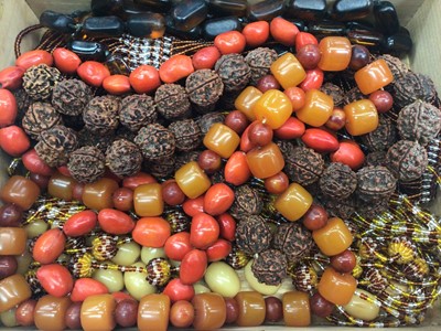 Lot 98 - Vintage simulated amber bead necklace, micro bead necklaces and nut shell necklaces