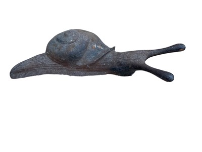 Lot 2537 - Cast metal doorstop in the form of a snail - impressed marks to the under side 'Ivy House, England', 33cm long