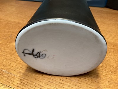 Lot 1206 - Prue Venables studio pottery black bottle vase with yellow interior, 18cm high