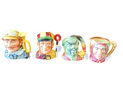 Lot 1176 - Five Royal Doulton character jugs - Veteran Motorist, Jockey, The Genie, Touchstone and Sir Francis Drake, together with two toby jugs Winston Churchill and Old Charlie (7)