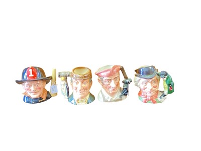 Lot 1178 - Eight Royal Doulton character jugs - The Fireman, Thomas Jefferson, Blacksmith, Merlin, The Auctioneer, The Walrus & Carpenter, Old Lad and Dick Turpin