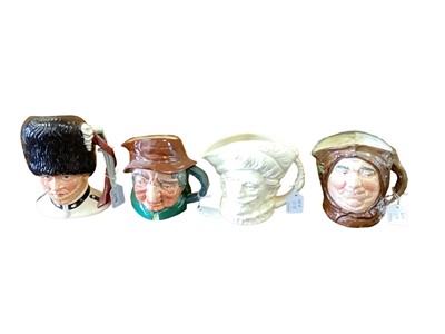 Lot 1179 - Seven Royal Doulton character jugs - The Guardsman, Johnny Appleseed, Cavalier, Friar Tuck, Uncle Tom Cobbleigh, Paddy and Drake together with a Beswick Sairey Gamp (8)