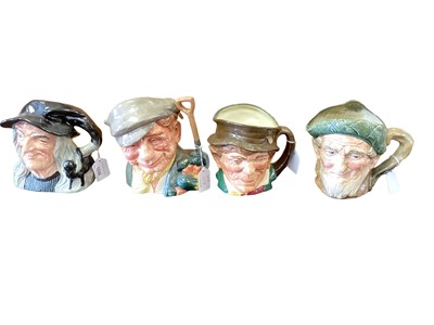 Lot 1236 - Seven Royal Doulton character jugs - The Witch, Owd Mac, 'arriet, Monty, The Gardener, Paddy and Old Charley