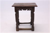 Lot 1661 - 17th century oak joint stool with moulded top...