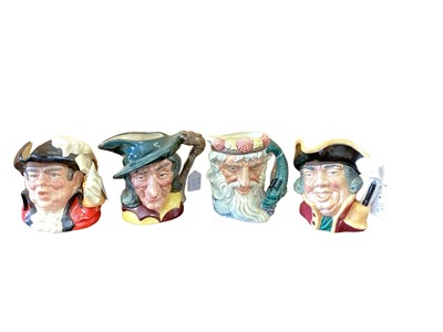 Lot 1239 - Eight Royal Doulton character jugs - Rip Van Winkle, Neptune, Town Crier, Parson Brown, Pied Piper, Robin Hood, Town Crier and Vicar of Bray