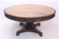 Lot 1664 - 19th century Anglo-Indian carved teak dining...