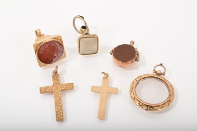 Lot 449 - Three gold and yellow metal fob seals, Victorian glazed locket and two 9ct gold cross pendants