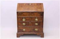 Lot 1667 - Early 18th century walnut featherbanded bureau...