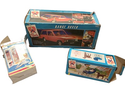 Lot 1945 - Four sindy dolls 033055X, boxed Range Rover, wardrobe, pram, horse box and other accessories plus some Barbie items