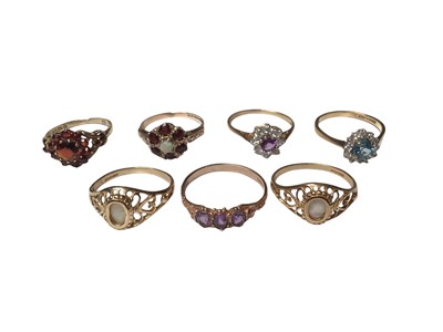 Lot 154 - Seven 9ct gold gem set cluster rings