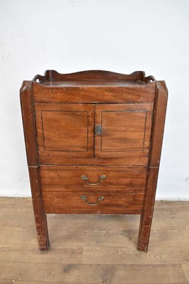 Lot 1244 - George III mahogany bedside cupboard, with pierced gallery and enclosed by twin doors with single drawer below to the faux drawer front, raised on square supports, 48cm wide x 41cm deep x 76cm h...