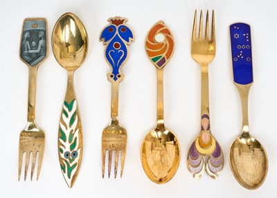 Lot 292 - Six Danish silver gilt and enamelled forks and spoons by Michelsen