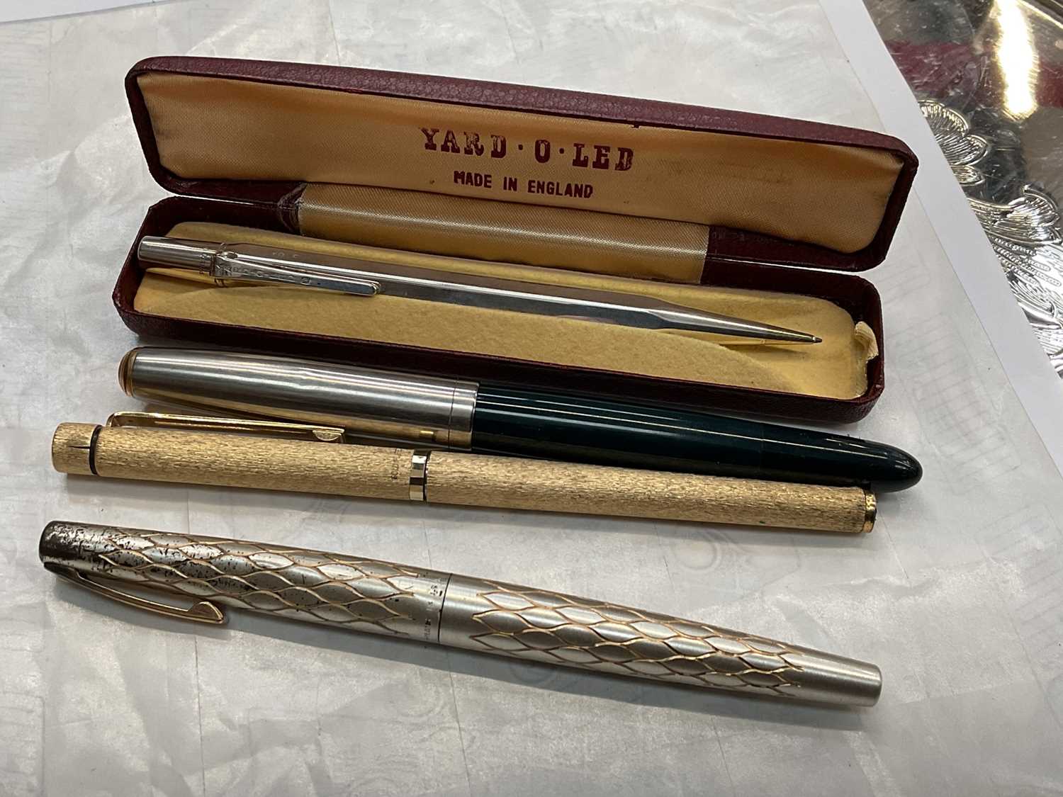 Lot 583 - Two Schaeffer pens and a silver yard o lead