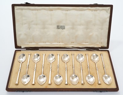 Lot 297 - Cased set of twelve teaspoons by Omar Ramsden