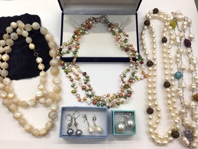 Lot 1029 - Cultured pearl multi coloured triple strand necklace, two other cultured pearl necklaces, mother of pearl bead necklace and three pairs of pearl earrings