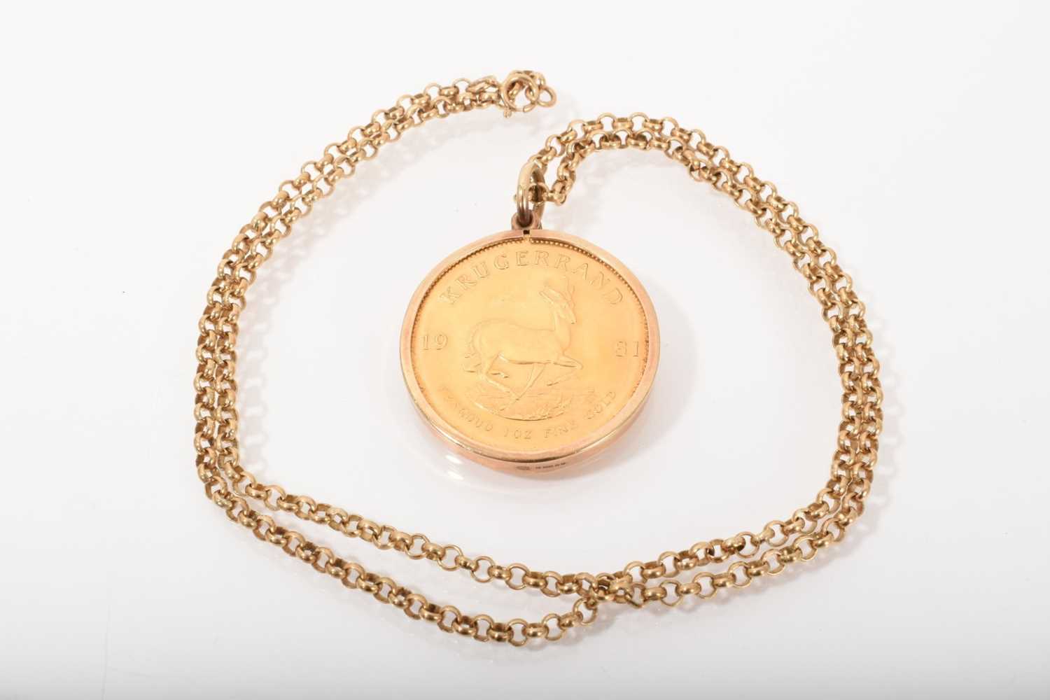 Lot 557 - South African gold Krugerand, 1981, in 9ct gold pendant mount on 9ct gold chain