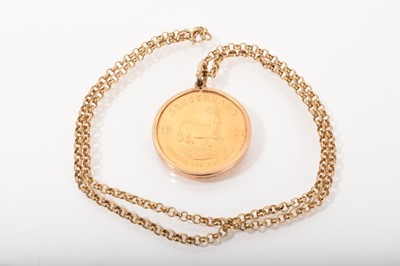 Lot 557 - South African gold Krugerand, 1981, in 9ct gold pendant mount on 9ct gold chain