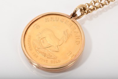 Lot 557 - South African gold Krugerand, 1981, in 9ct gold pendant mount on 9ct gold chain