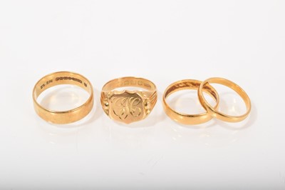 Lot 561 - Two 22ct gold wedding rings, 18ct gold wedding ring and 18ct gold signet ring (4)