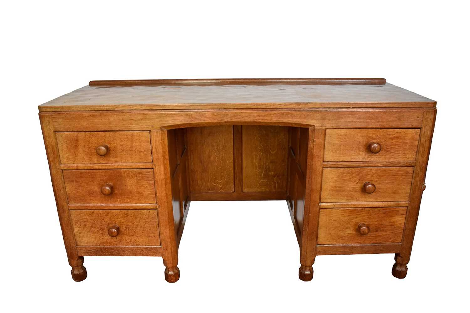 Lot 1206 - Robert ‘Mouseman’ Thompson oak desk and leather desk chair