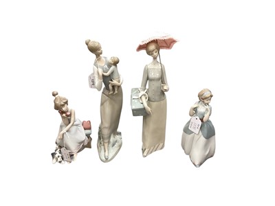 Lot 1275 - Eight Lladro porcelain figures including lady carrying a child and girl on the telephone