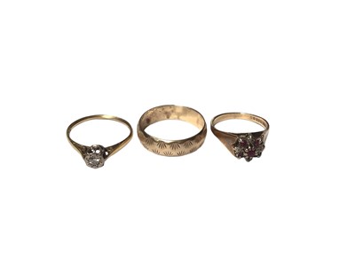 Lot 178 - 18ct gold diamond single stone ring, 9ct gold wedding ring and 9ct gold gem set flower head cluster ring (3)