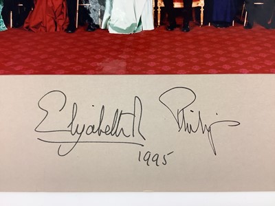 Lot 3 - H.M. Queen Elizabeth II and H.R.H. The Duke of Edinburgh, signed presentation colour photograph of the Royal couple with guests following a Royal dinner including Air Vice Marshal Sir John Severn...