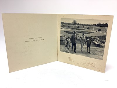 Lot 4 - H.M. Queen Elizabeth II and H.R.H. The Duke of Edinburgh, signed 1959 Christmas card with gilt embossed Royal cyphers to cover, black and white photograph to the interior of the Royal Family in...