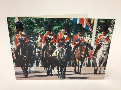 Lot 9 - H.M. Queen Elizabeth II and H.R.H. The Duke of Edinburgh, signed 1986 Christmas card with gilt embossed Royal cyphers to the interior cover, colour photograph to the cover of The Queen at the Tr...