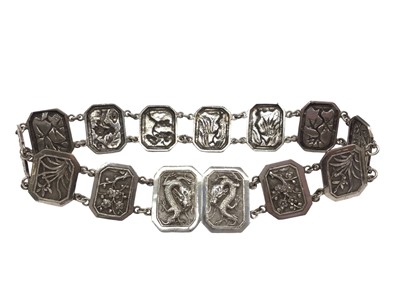 Lot 182 - Chinese silver panel belt with bamboo, prunus and dragon decoration