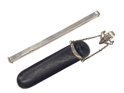 Lot 183 - Edwardian silver combination sealing wax holder/ ruler, together with a Victorian silver mounted leather spectacles holder