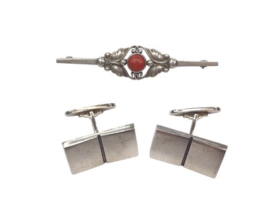 Lot 188 - Georg Jensen silver bar brooch set with a central coral cabochon, no. 224B, and a pair of Georg Jensen silver cufflinks, no.109