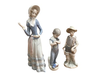 Lot 1230 - Six Lladro porcelain figures including boy with fishing rod and boy with hammer