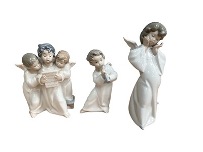 Lot 1231 - Twelve Lladro porcelain figures of Angels, some playing musical instruments