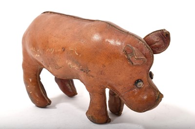 Lot 792 - A leather Liberty style figure of a rhinoceros