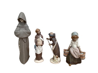 Lot 1246 - Four Lladro figures including monks and a girl carrying pails of water