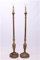 Lot 1692 - Pair of gilt gesso standard lamps, each with...