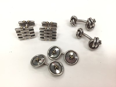 Lot 193 - Three pairs of Tiffany & Co silver cufflinks to include a pair of knots and two pairs of silver and 18ct gold cufflinks