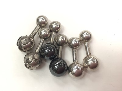 Lot 195 - Three pairs of Tiffany & Co silver ball end cufflinks to include one globe pair, one hematite pair and one other pair