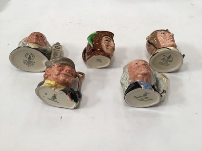 Lot 1264 - Collection of 20 Royal Doulton character jugs including Charles Dickens, W.G. Grace, The Golfer and The Hampshire Cricketer, some limited edition