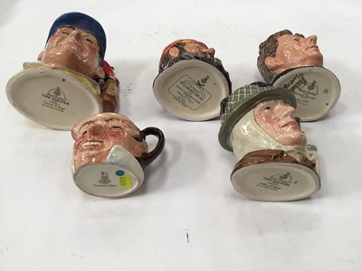 Lot 1264 - Collection of 20 Royal Doulton character jugs including Charles Dickens, W.G. Grace, The Golfer and The Hampshire Cricketer, some limited edition