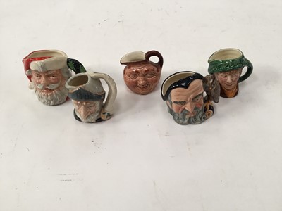 Lot 1266 - Collection of 25 Royal Doulton character jugs including Santa Claus, Fat Boy, Robin Hood and Christmas Stocking Snowman