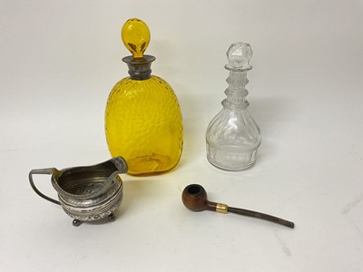 Lot 1110 - Georgian silver cream jug, three-ring decanter, silver mounted amber glass decanter, and a pipe