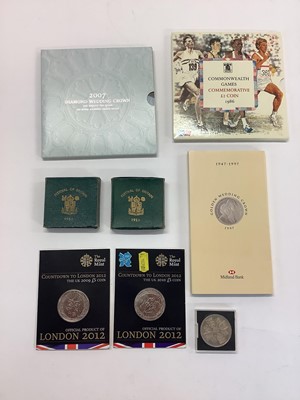 Lot 547 - World - Mixed coinage to include G.B. Royal Mint proof set 1970, brilliant UNC flat packs, silver sports fobs, U.S. silver Dollar 1878 GF-AVF & other issues (Qty)