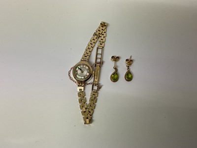 Lot 214 - 1960s 9ct gold ladies wristwatch and a pair of 9ct gold peridot earrings