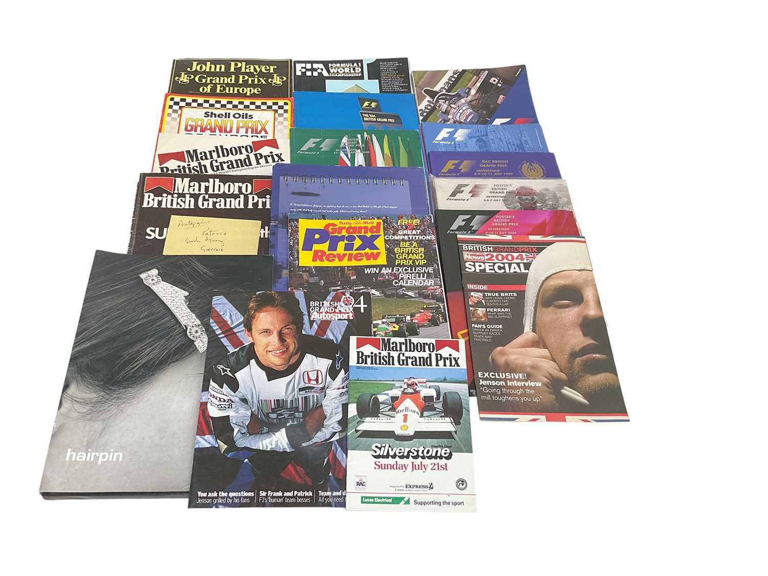 Lot 139 - Group of British Grand Prix programmes including a 1982 Brands Hatch programme signed by Riccardo Patrese, Gordon Murray and Roberto Guerrero (1 box).